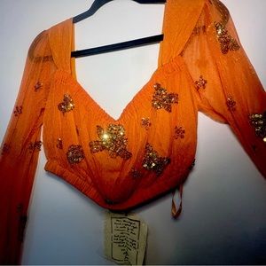 Handmade orange embroidered whimsical top